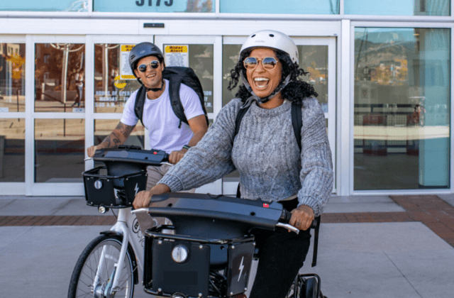 People enjoying the e-bike share program