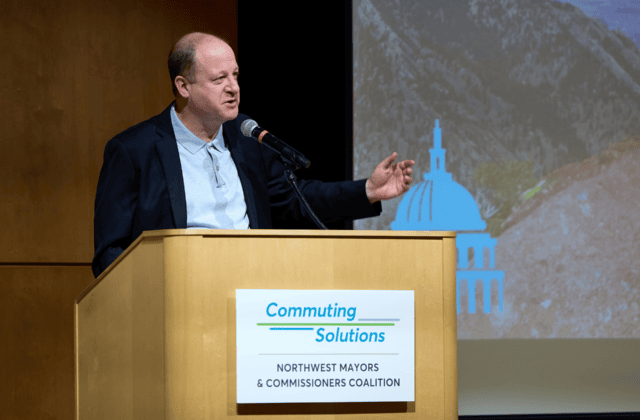 Colorado Governor Polis addresses attendees at the 16th Legislative Breakfast