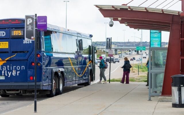 passengers board the Flatiron Flyer bus in Broomfield, Colorado.
